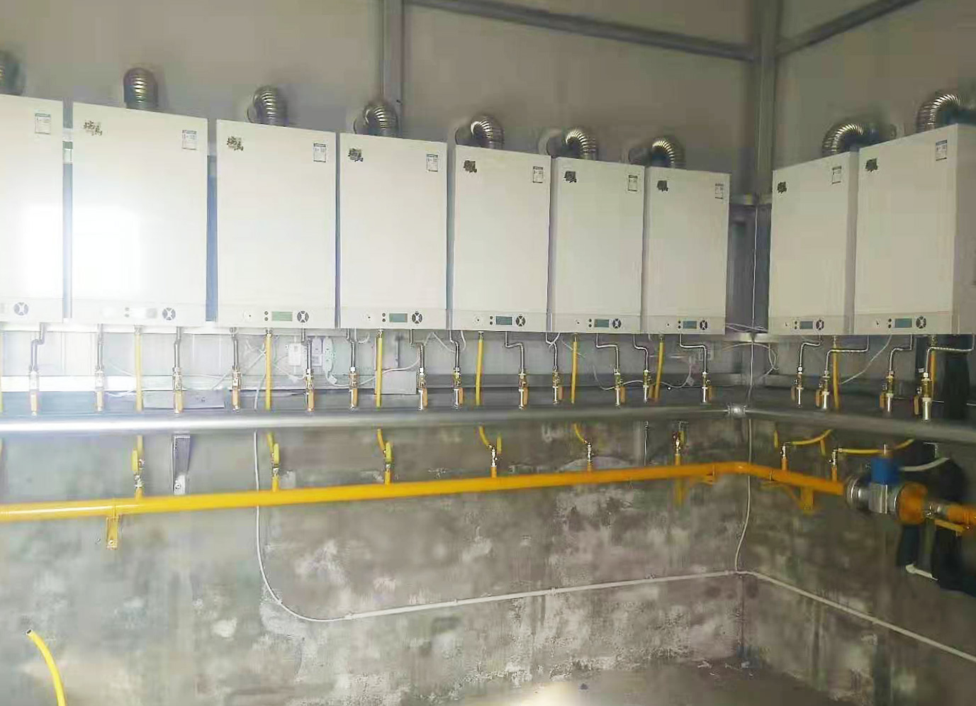 优德88壁挂炉多台并联应用案例